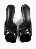 The Cool-Girl Bow: Black Patent Square-Toe Mules with a 4.13" Stiletto