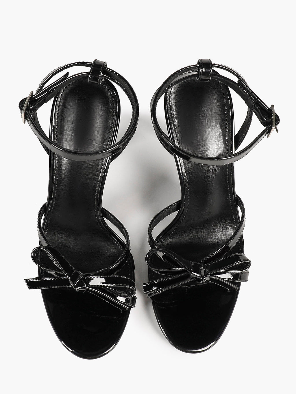 Architectural Bow Stilettos: Glossy Black Multi-Strap Heels for Modern Chic