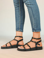 Black Strappy Gladiator Sandals with Secure Dual Buckle Fit and Soft Footbed
