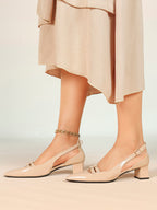 Nude Patent Pointed-Toe Slingback Pumps with Double Buckle Straps and Block Heel