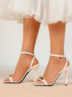 Chic White Glossy Heeled Sandals with Metal Accent - Square Toe Stilettos for Weddings & Parties